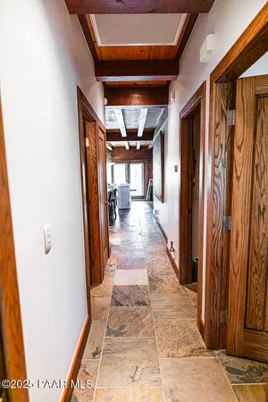 a view of a large window with wooden floor