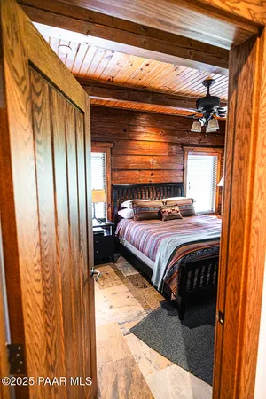 a view of balcony with couch and chairs