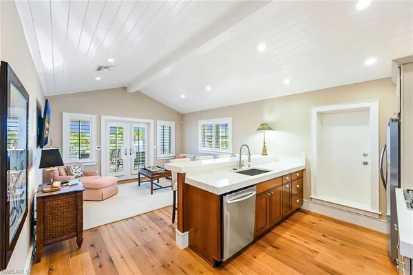 a kitchen with a stove and a refrigerator