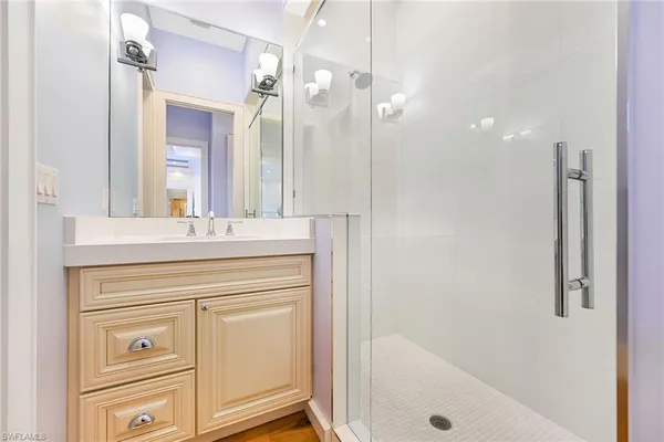 a kitchen with a sink and a washer dryer
