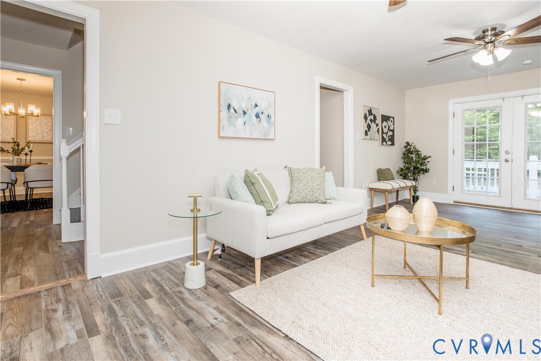 13110 Hensley Road Midlothian, VA 23112 - Photo 11 of 24 a living room with furniture and wooden floor