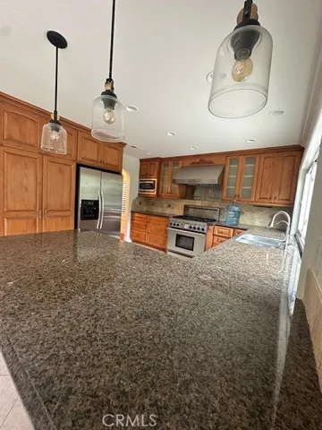 a room with furniture and a chandelier