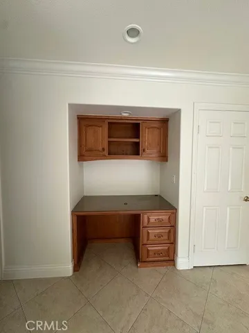 a view of a swimming pool with an outdoor space and seating area