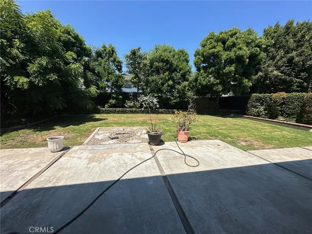 a view of swimming pool with a yard