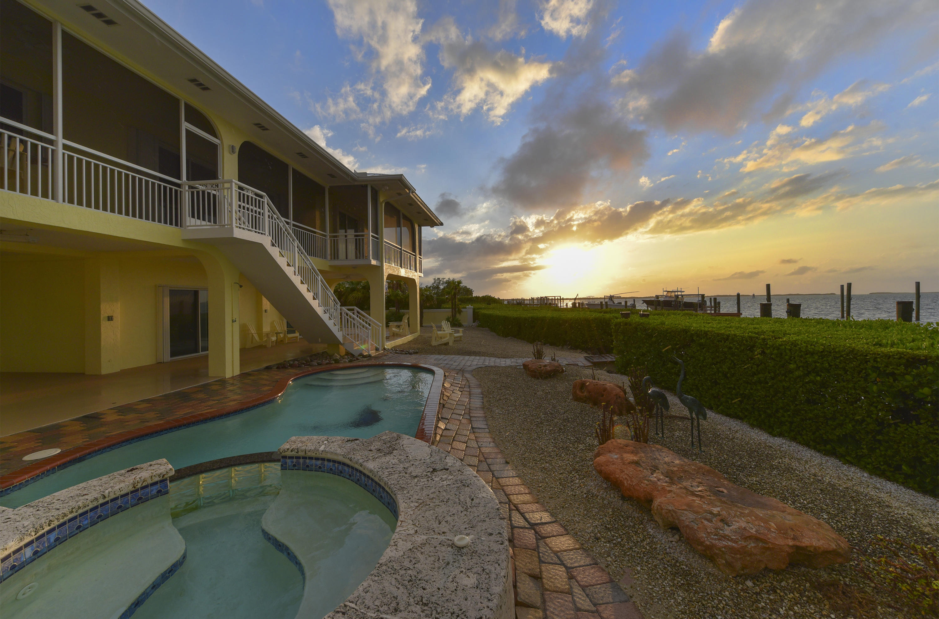 69 Mutiny Place Key Largo, FL 33037 - Photo 34 of 36 Sunset by the Pool