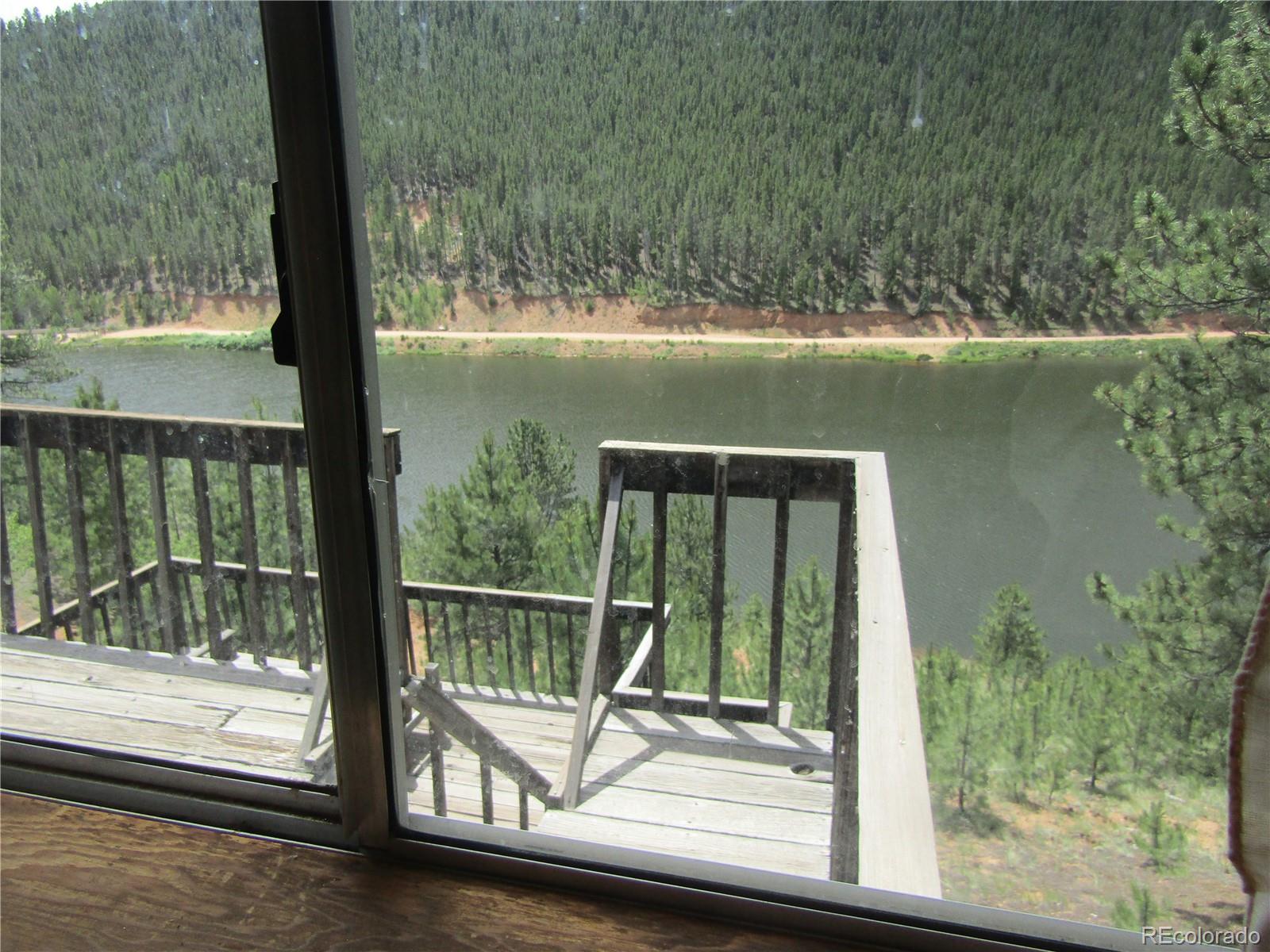 676 Gross Road Bailey, CO 80421 - Photo 15 of 18 a view of lake from balcony