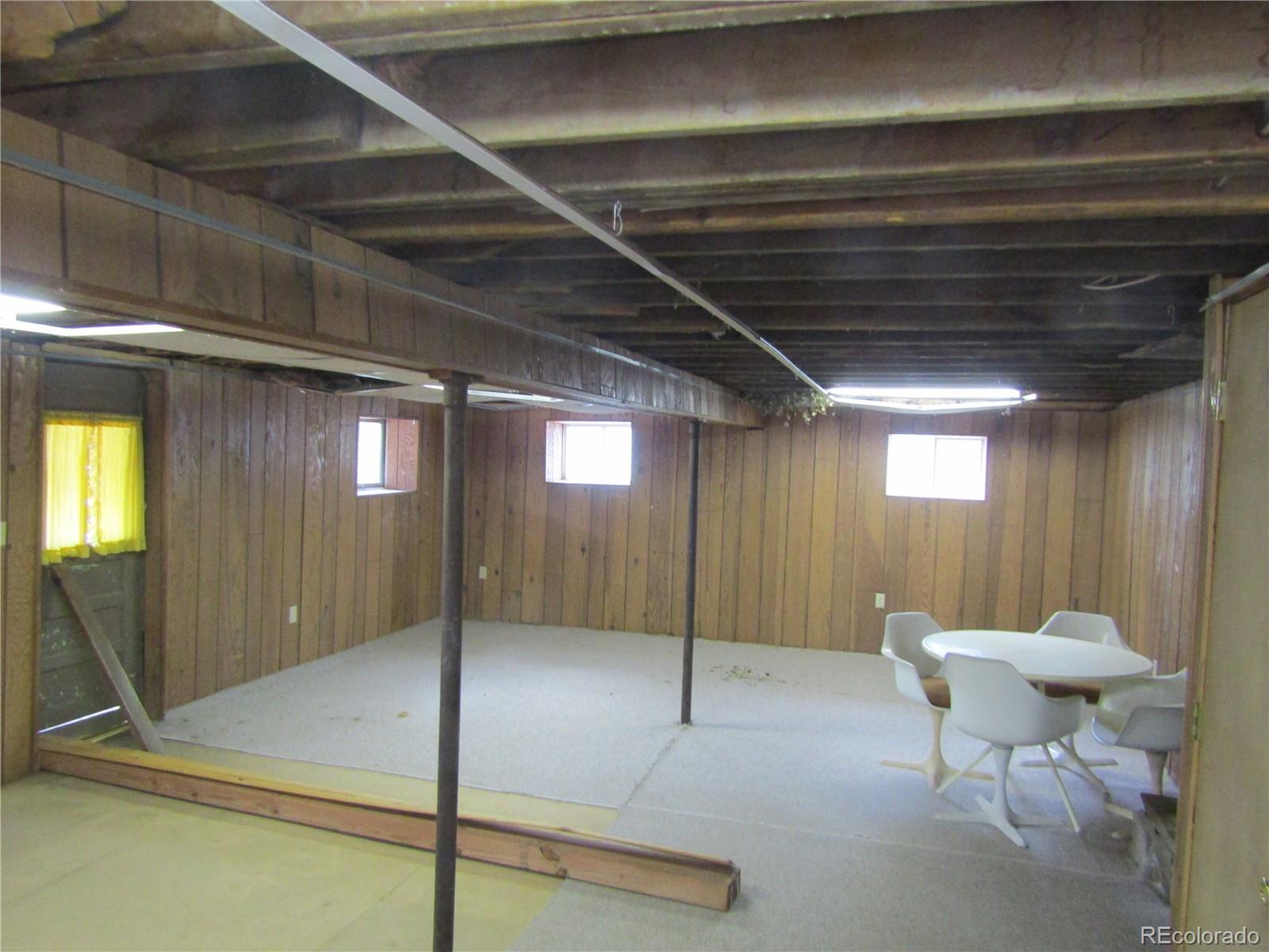 676 Gross Road Bailey, CO 80421 - Photo 16 of 18 a bathroom with a mirror and a shower