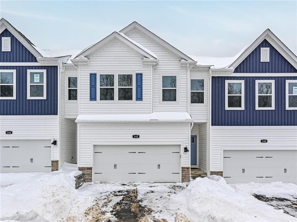 a front view of a house with a bed