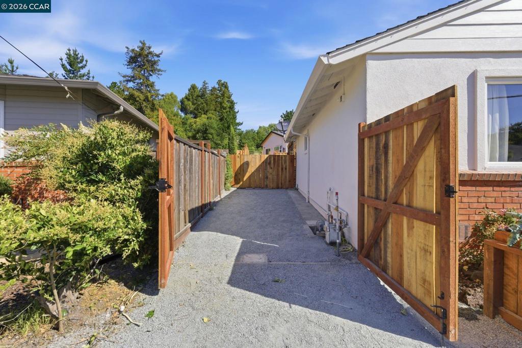 3196 Rohrer Drive Lafayette, CA 94549 - Photo 27 of 30 a view of a house with a backyard