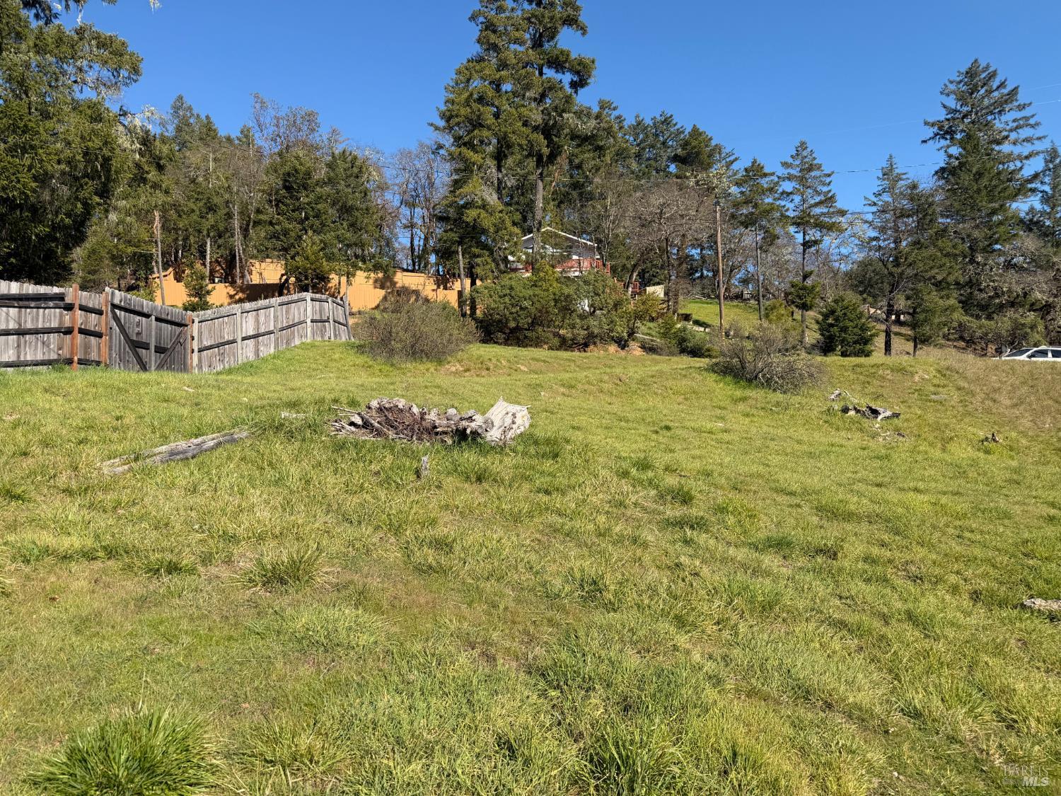 26600 Sherwood Road Willits, CA 95490 - Photo 5 of 10 a view of a yard with an outdoor seating