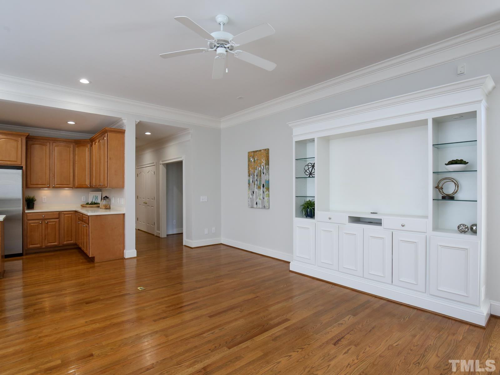 3905 Bentley Meadow Lane Raleigh, NC 27612 - Photo 11 of 40 a view of a kitchen with a sink and a refrigerator
