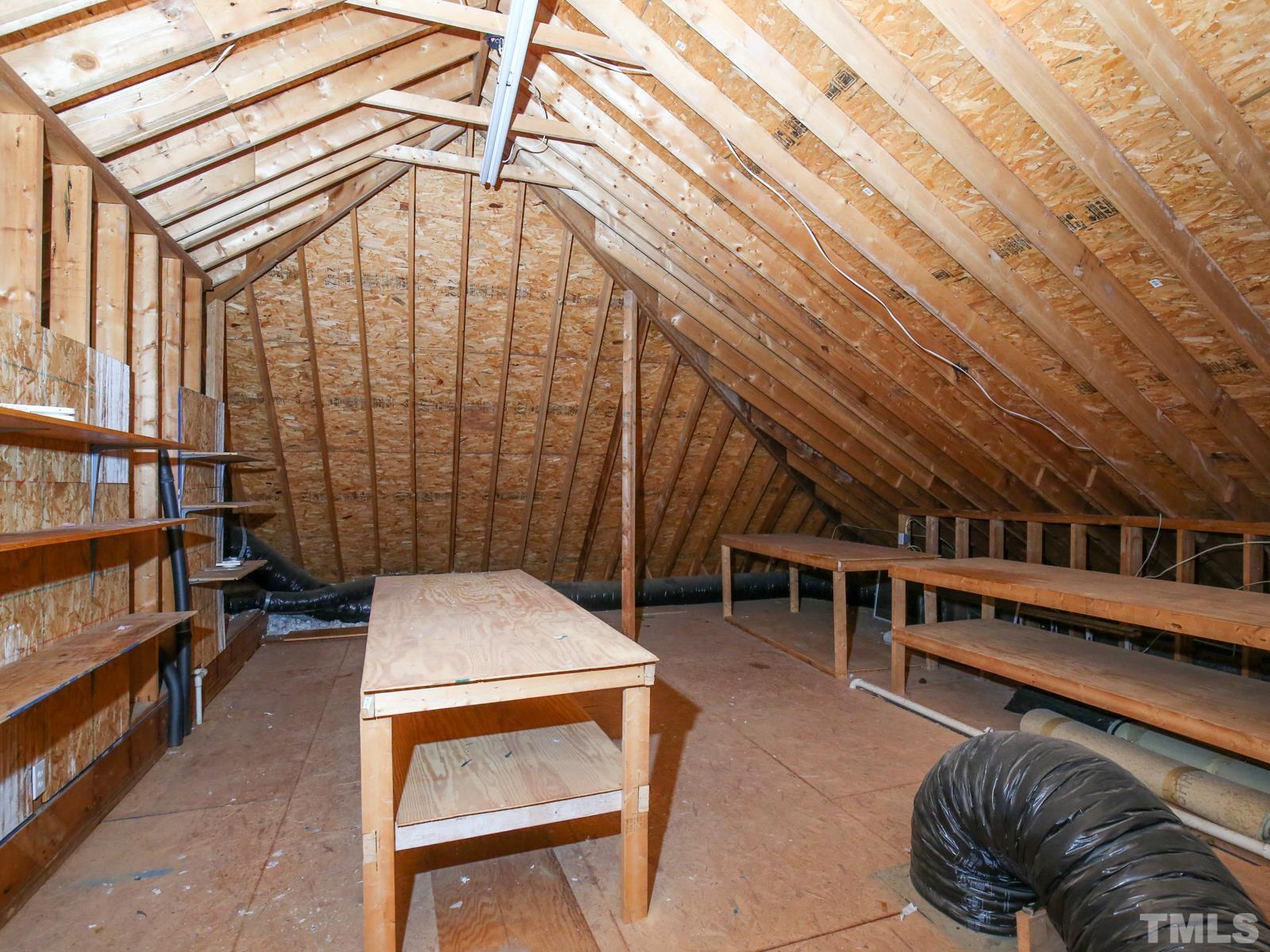 3905 Bentley Meadow Lane Raleigh, NC 27612 - Photo 35 of 40 a backyard of a house with outdoor seating