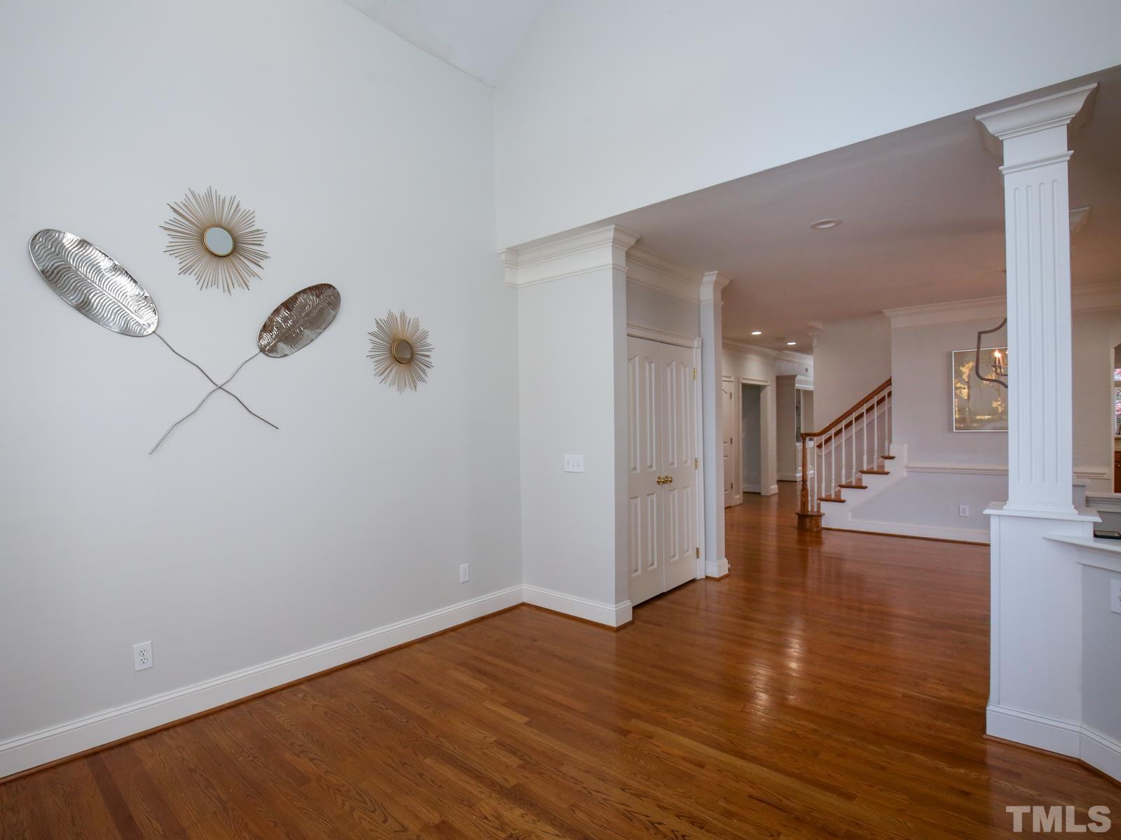 3905 Bentley Meadow Lane Raleigh, NC 27612 - Photo 7 of 40 a view of an entryway with wooden floor