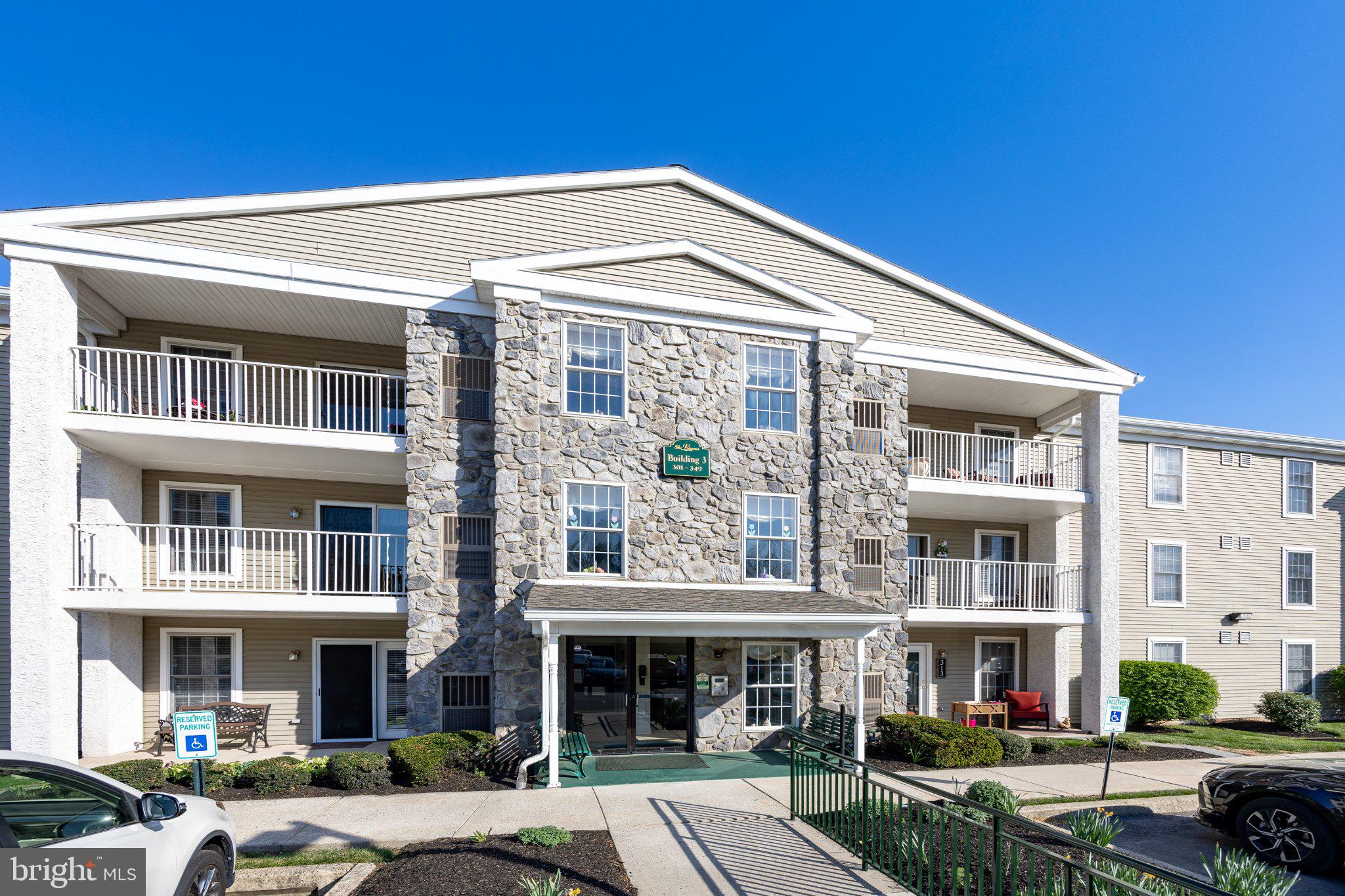 Charming stone-fronted apartment complex.
