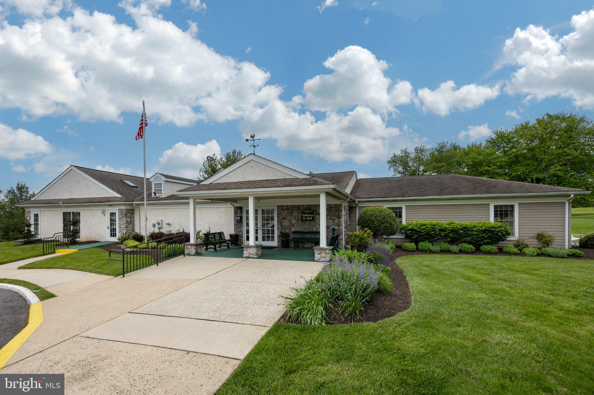 331 Brandon Road Norristown, PA 19403 - Photo 26 of 44 Charming community center with lush greenery.