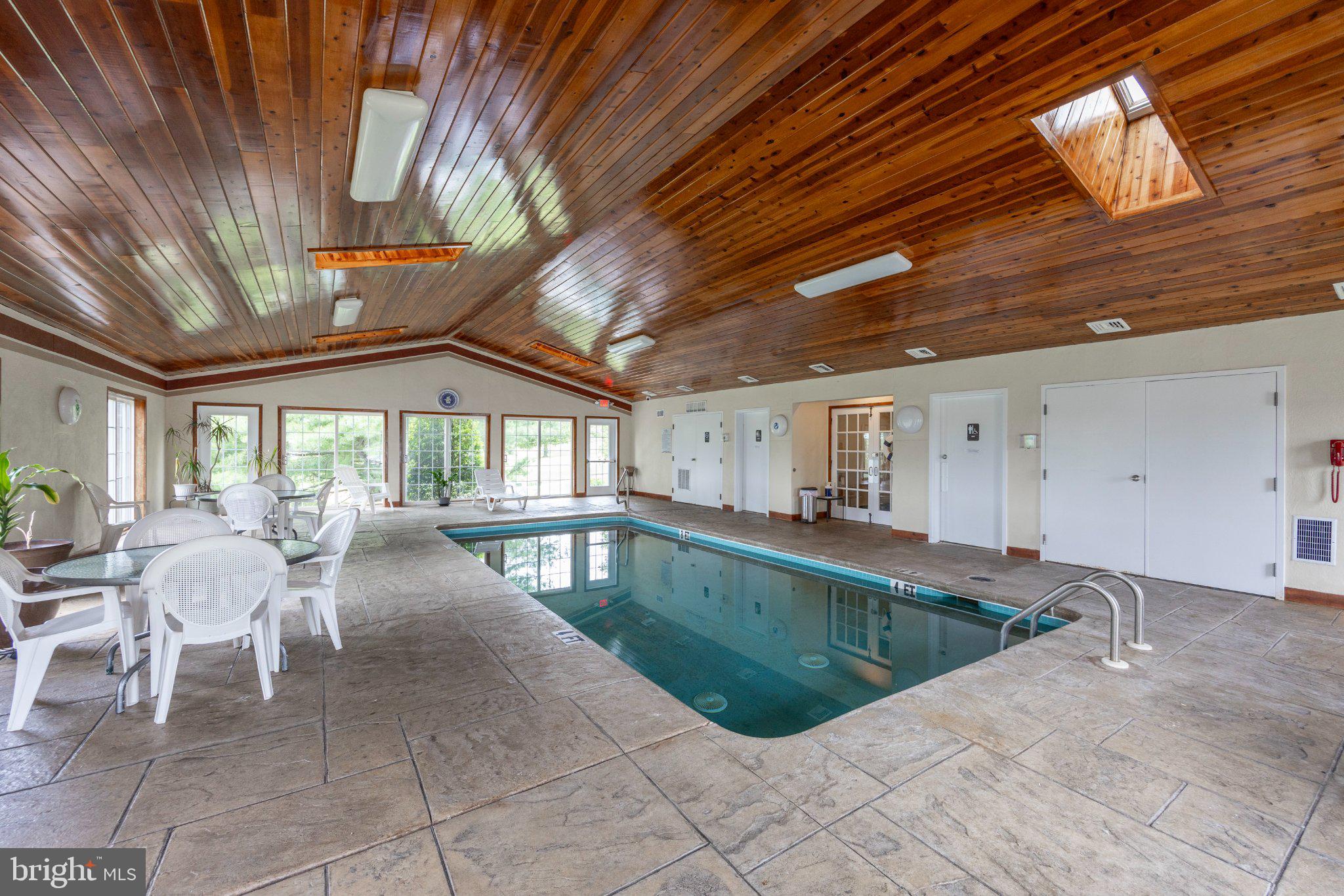 331 Brandon Road Norristown, PA 19403 - Photo 28 of 44 Indoor oasis with a serene pool.