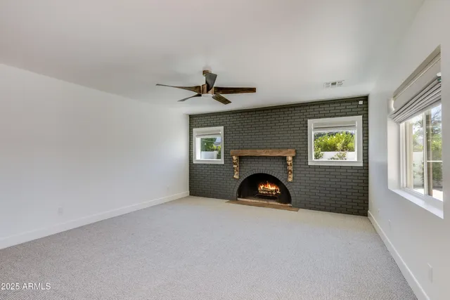 a bathroom with a shower and a sink