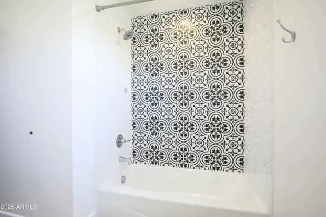 a view of a backyard with potted plants