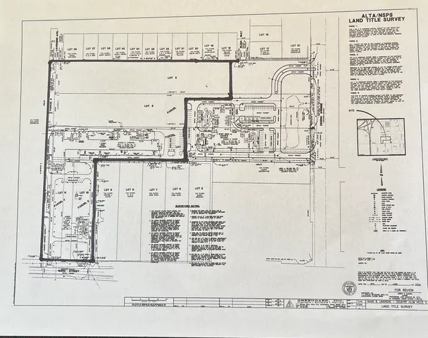 a black white and white photo of a lake