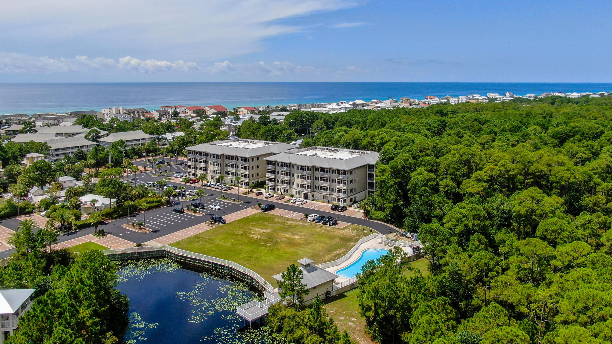 231 Somerset Bridge Road, Unit 1404 Santa Rosa Beach, FL 32459 - Photo 2 of 40 an aerial view of a house with a garden