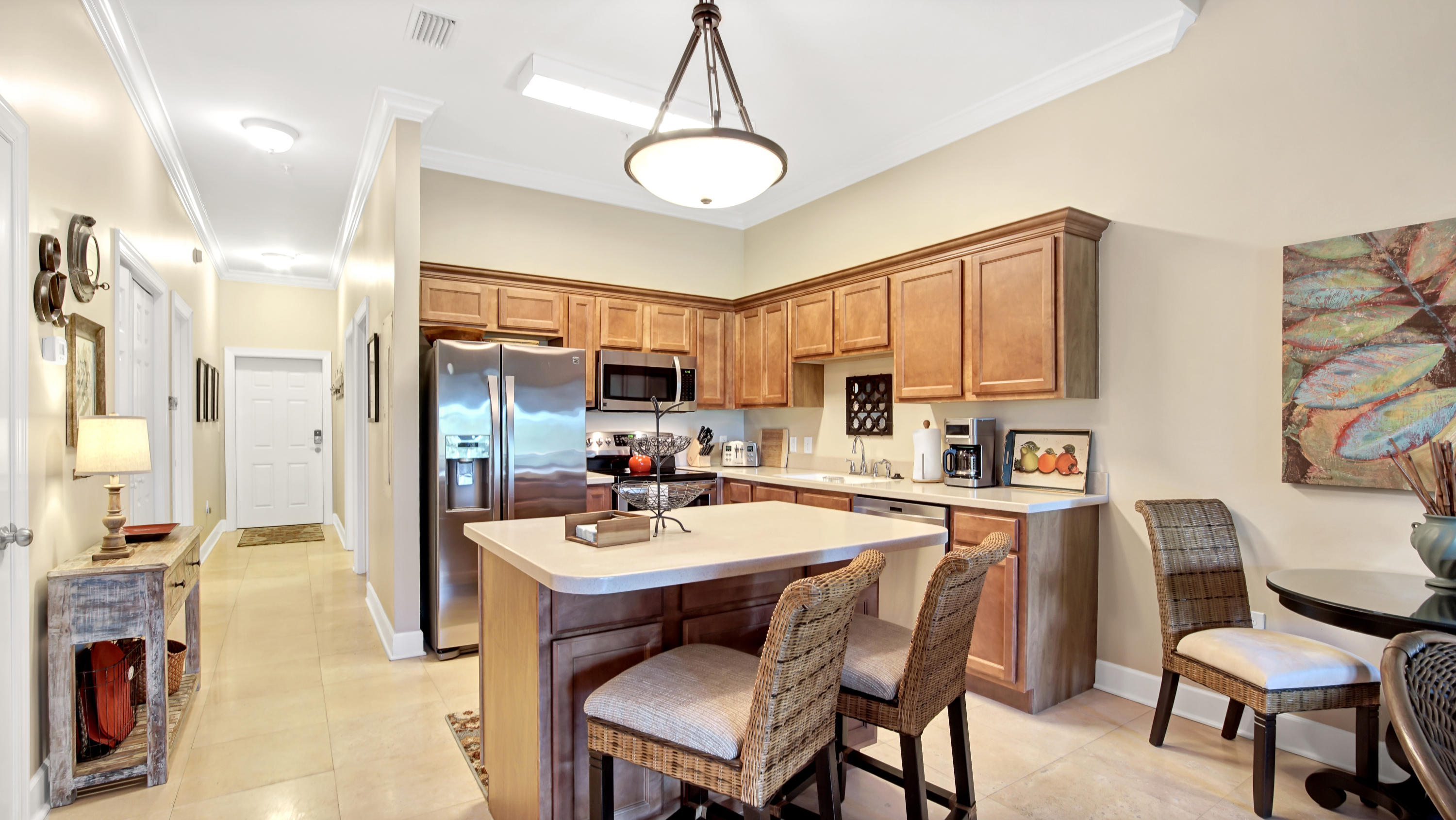 231 Somerset Bridge Road, Unit 1404 Santa Rosa Beach, FL 32459 - Photo 26 of 40 a kitchen with a sink stove and refrigerator