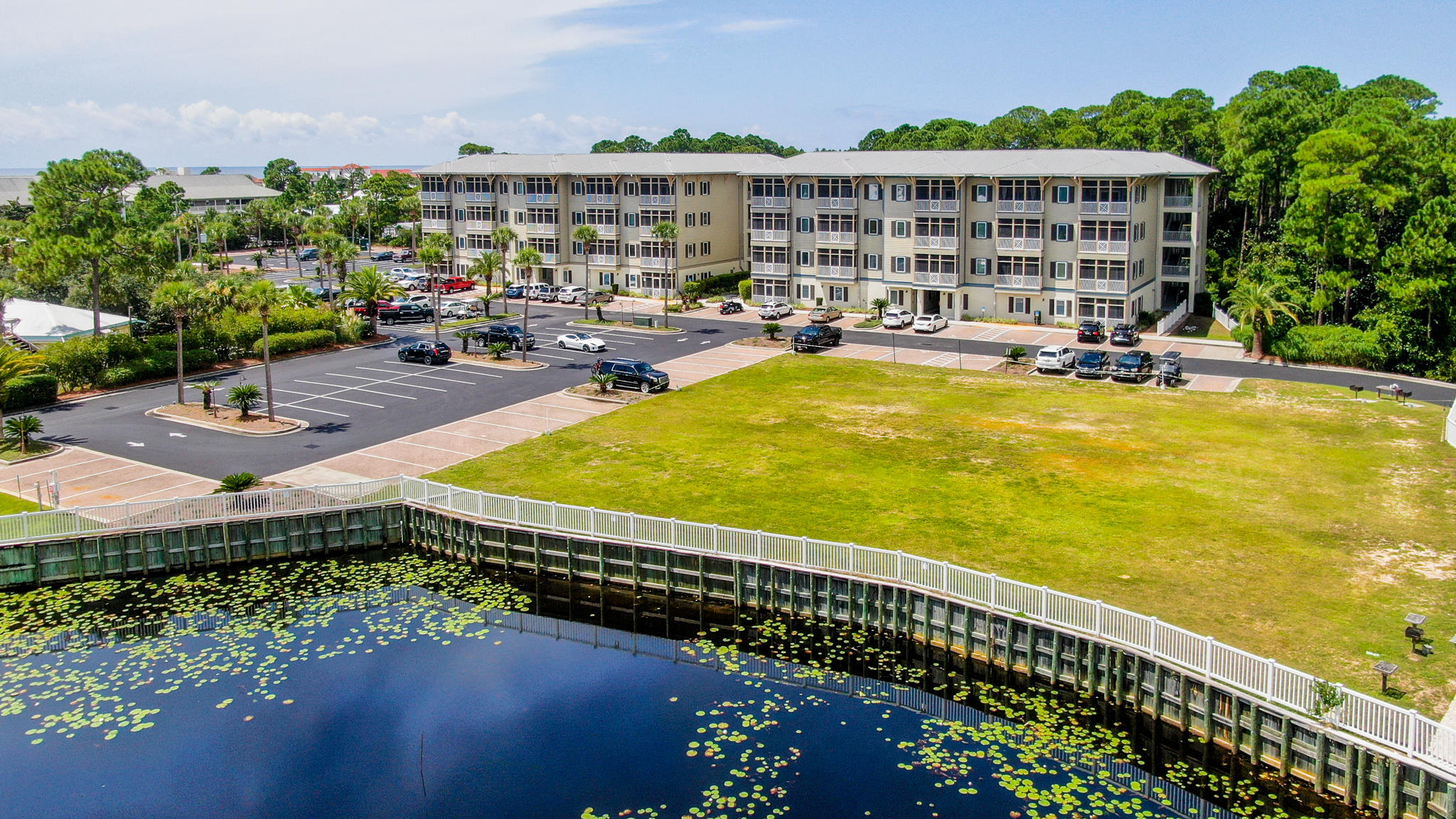 231 Somerset Bridge Road, Unit 1404 Santa Rosa Beach, FL 32459 - Photo 31 of 40 a view of swimming pool with outdoor seating and plants
