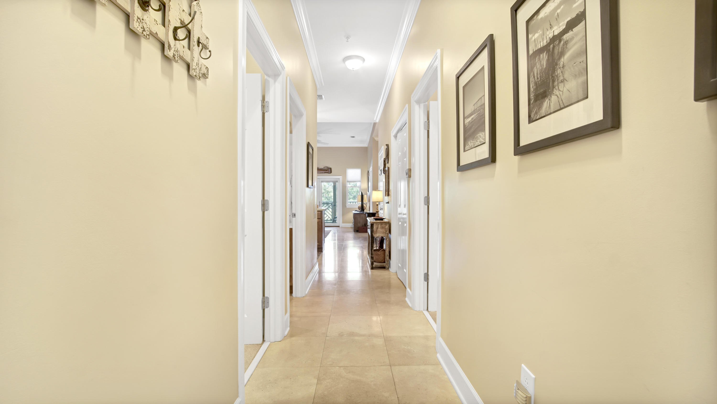 231 Somerset Bridge Road, Unit 1404 Santa Rosa Beach, FL 32459 - Photo 5 of 40 a view of a hallway with wooden floor