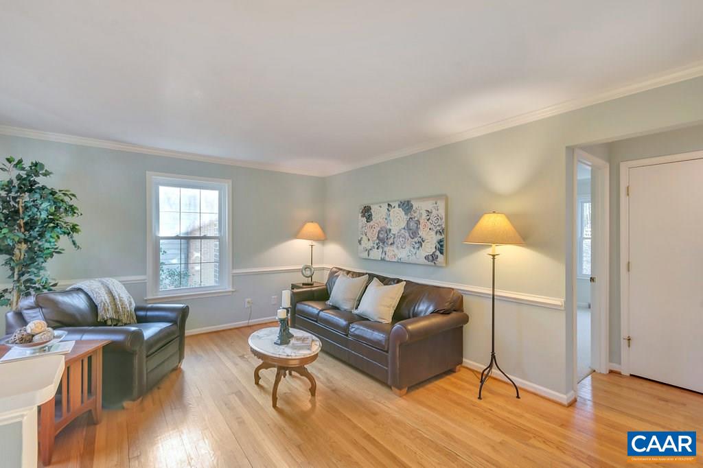 304 North Bennington Road Charlottesville, VA 22901 - Photo 5 of 37 a living room with furniture rug and wooden floor
