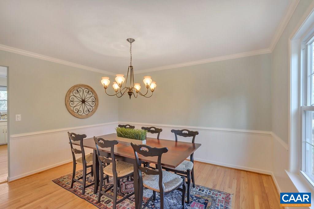304 North Bennington Road Charlottesville, VA 22901 - Photo 8 of 37 a view of a dining room with furniture and chandelier