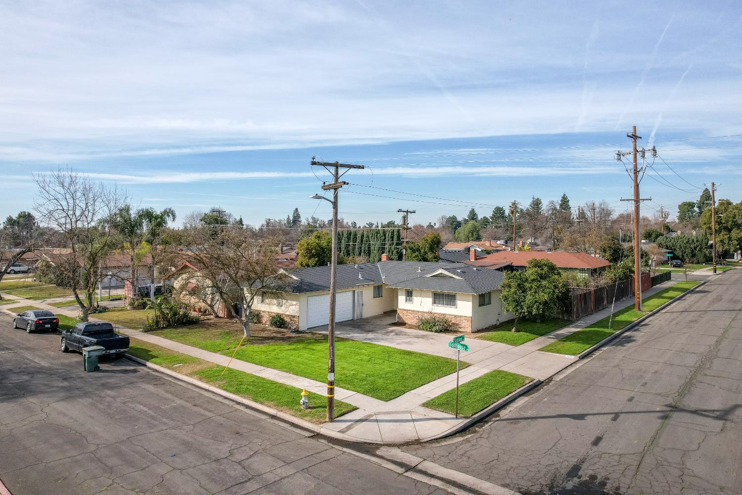 a view of a terrace with a garden and bench