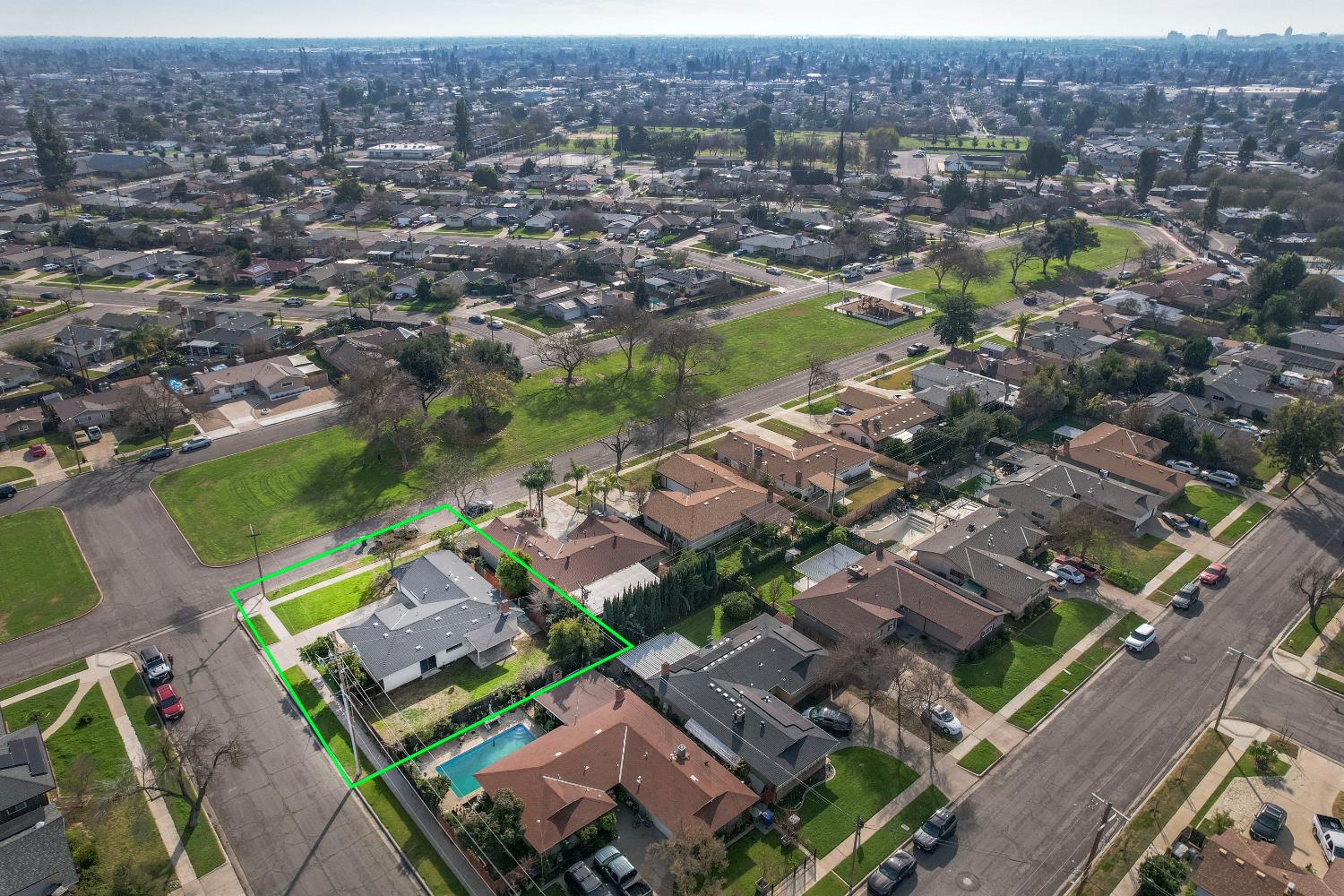 3955 North Tollhouse Road Fresno, CA 93726 - Photo 17 of 17 an aerial view of a city with lots of residential buildings