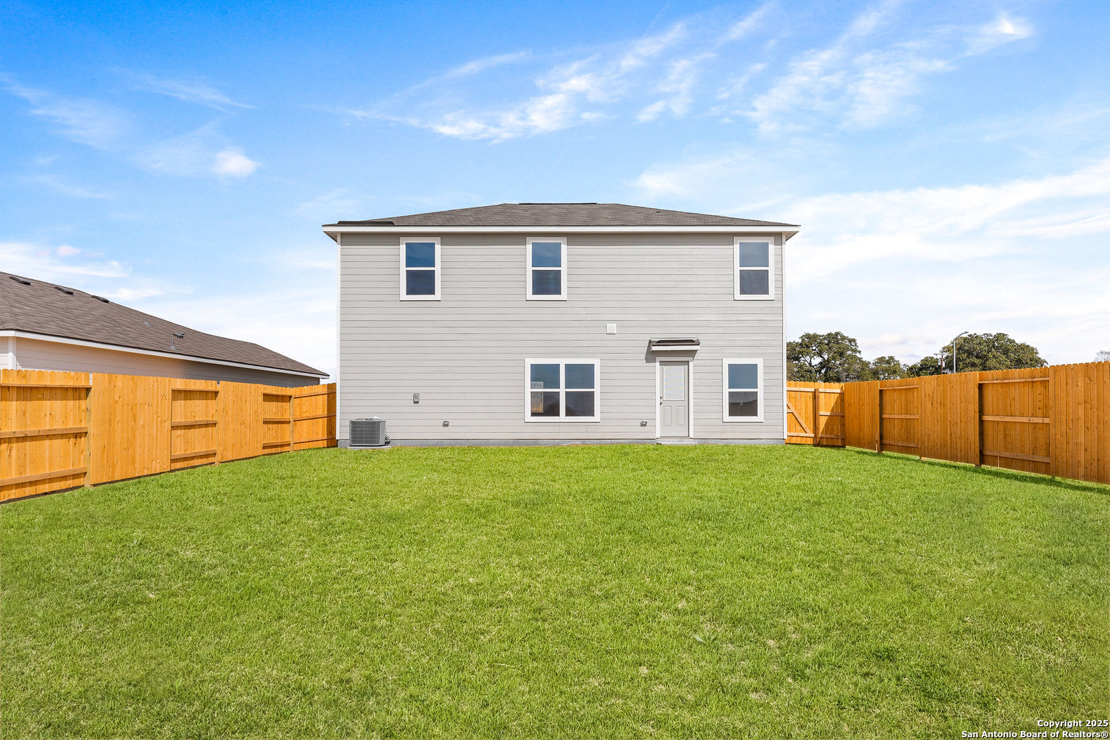16020 Stratford Cove Lytle, TX 78052 - Photo 2 of 29 a view of a backyard of house