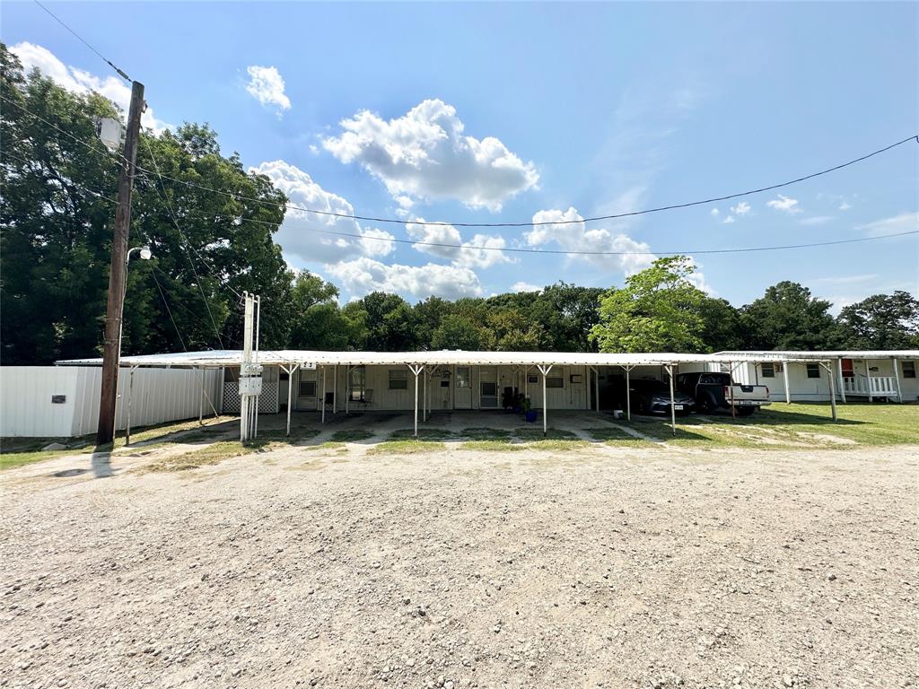 3210 Rural Ranch Road, Unit 14 Gainesville, TX 76240 - Photo 14 of 19 a view of a backyard with swimming pool