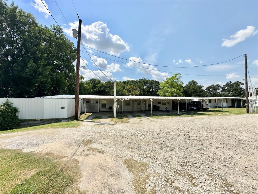3210 Rural Ranch Road, Unit 14 Gainesville, TX 76240 - Photo 16 of 19 a view of a backyard