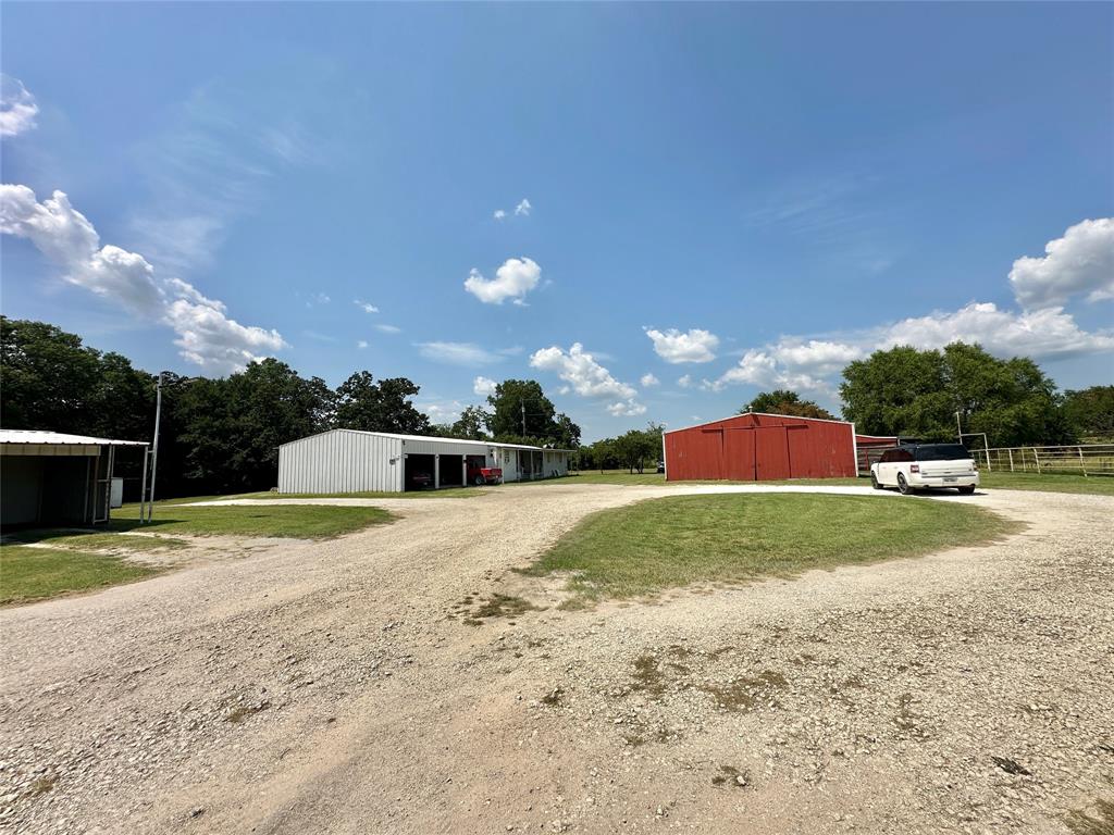 3210 Rural Ranch Road, Unit 14 Gainesville, TX 76240 - Photo 19 of 19 a view of a backyard