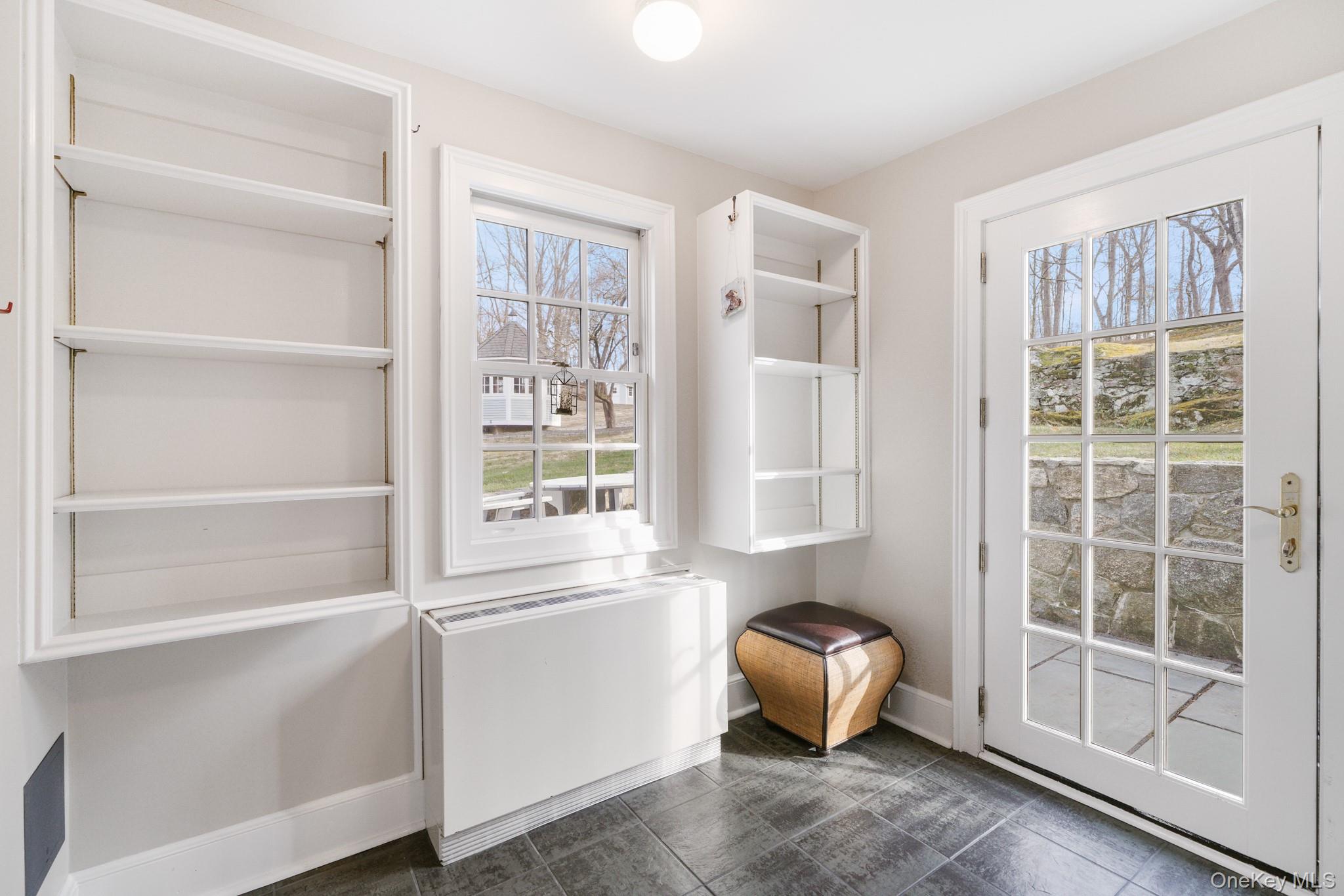 320 Illington Road Ossining, NY 10562 - Photo 12 of 42 Doorway with baseboards and radiator heating unit