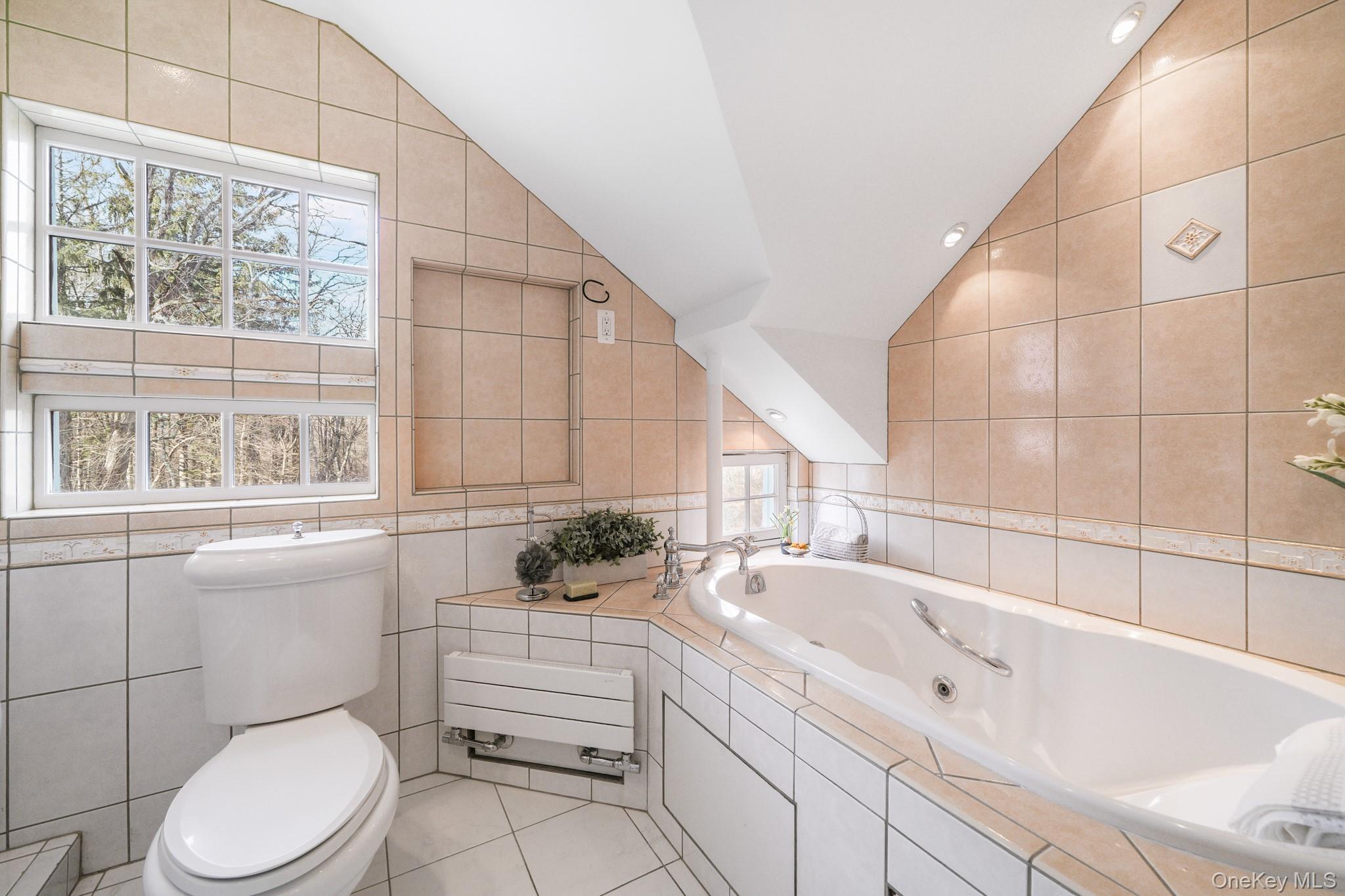 320 Illington Road Ossining, NY 10562 - Photo 16 of 42 a bathroom with a sink a toilet and bathtub