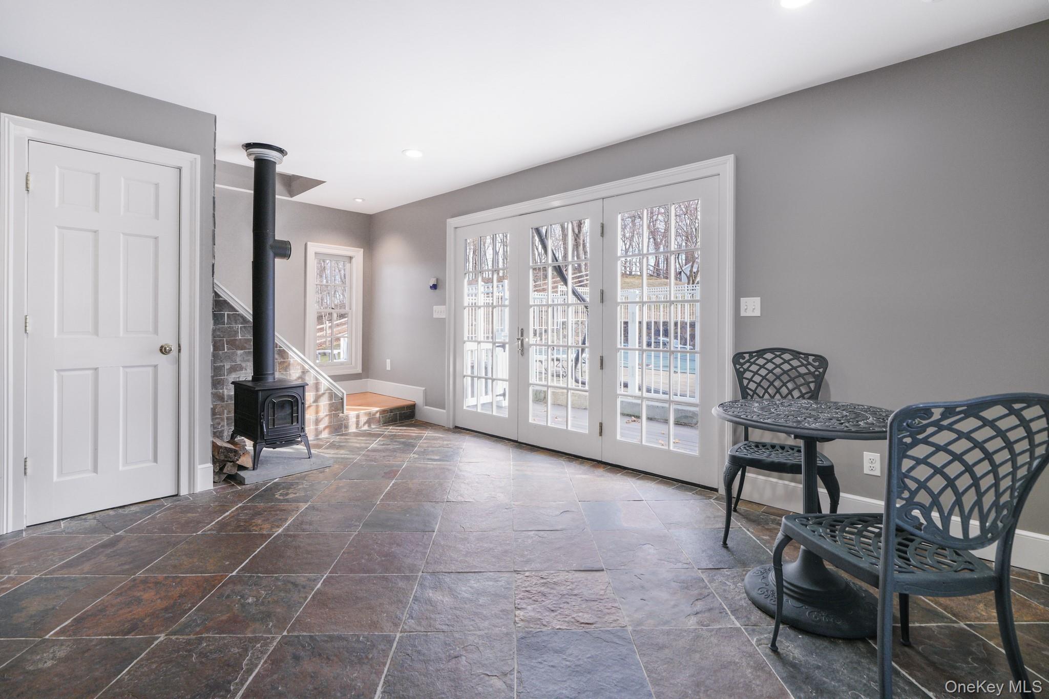 320 Illington Road Ossining, NY 10562 - Photo 21 of 42 a living room with furniture and a large window