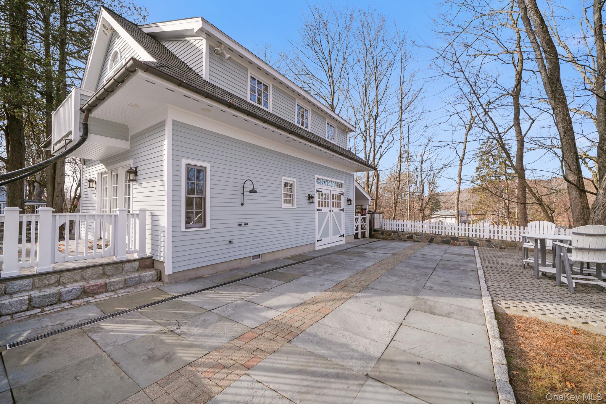 320 Illington Road Ossining, NY 10562 - Photo 23 of 42 a view of a building with a bench