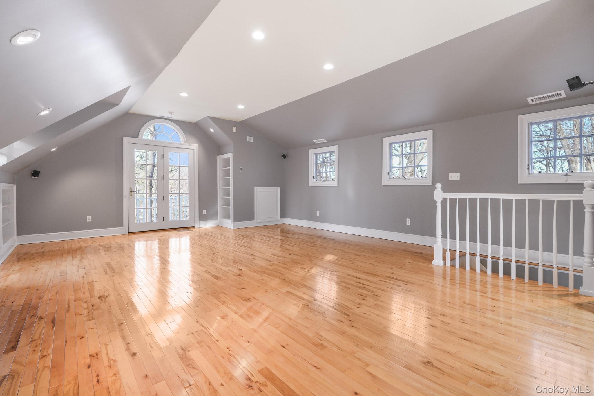 320 Illington Road Ossining, NY 10562 - Photo 28 of 42 an empty room with wooden floor and windows