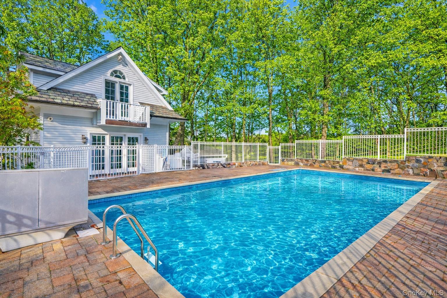 320 Illington Road Ossining, NY 10562 - Photo 29 of 42 a view of a house with swimming pool