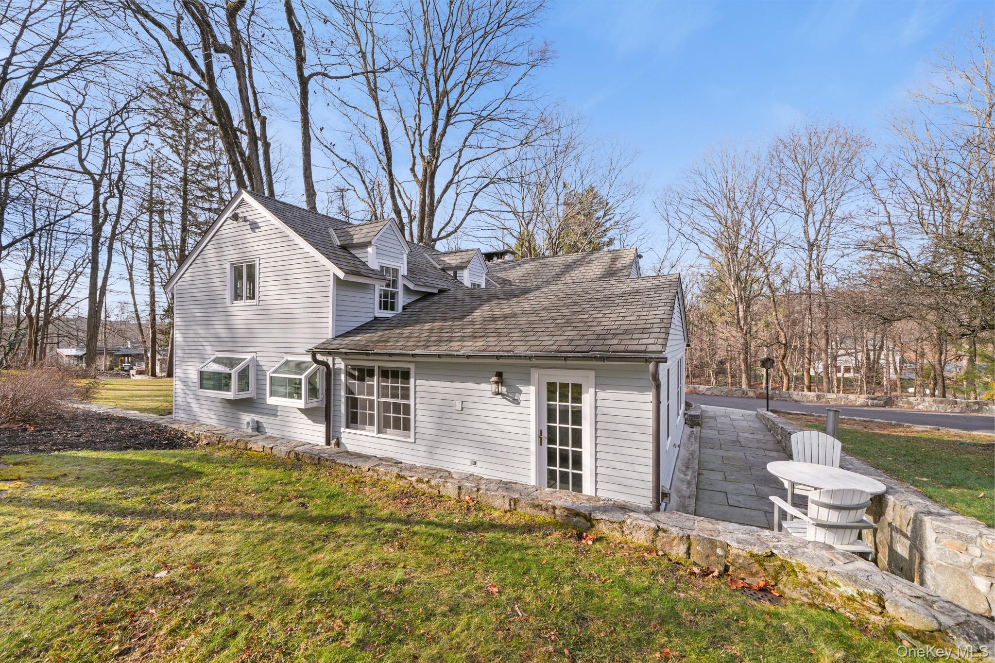 320 Illington Road Ossining, NY 10562 - Photo 31 of 42 a house that has tree in front of it