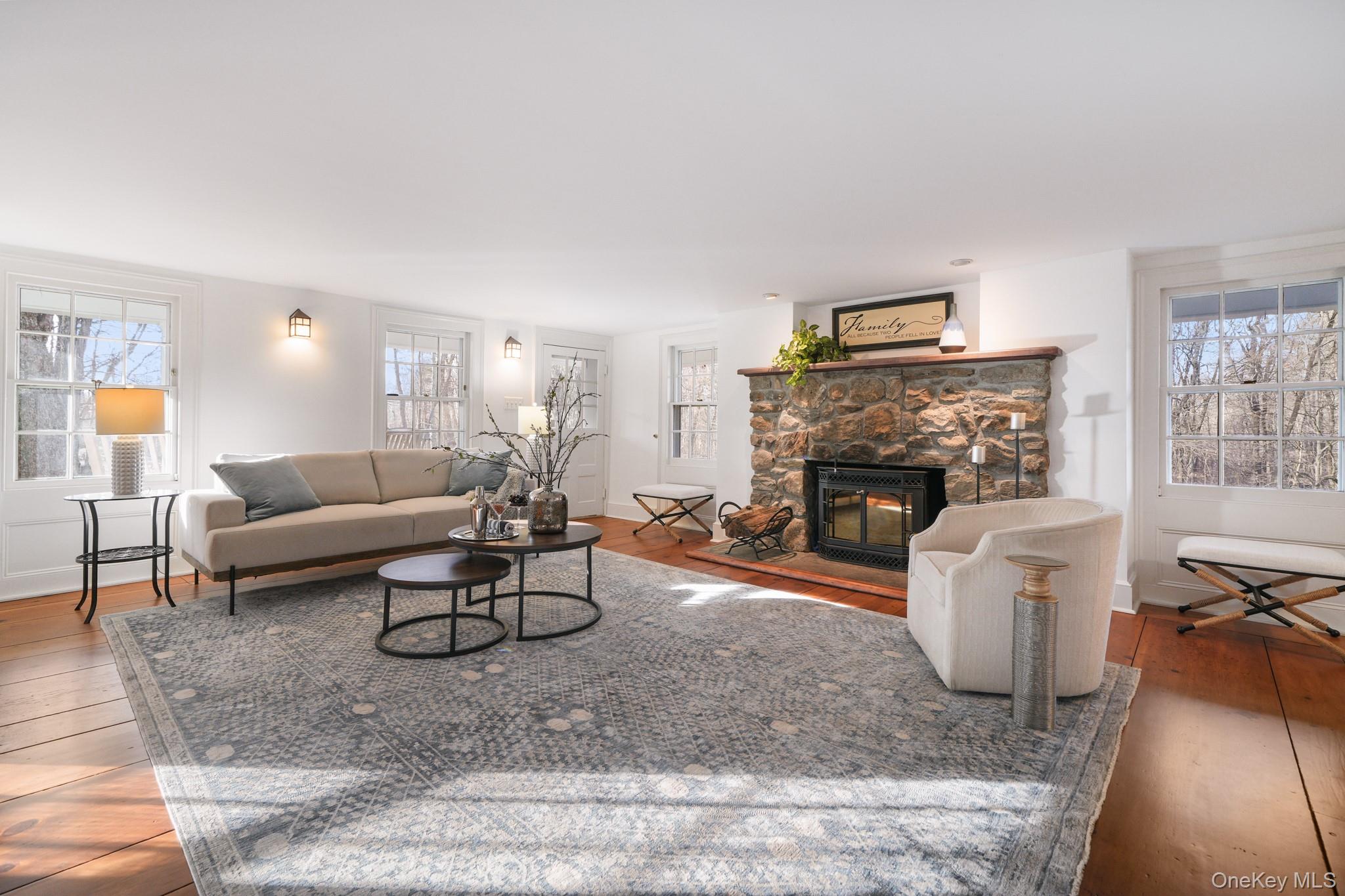320 Illington Road Ossining, NY 10562 - Photo 6 of 42 a living room with furniture and a fireplace