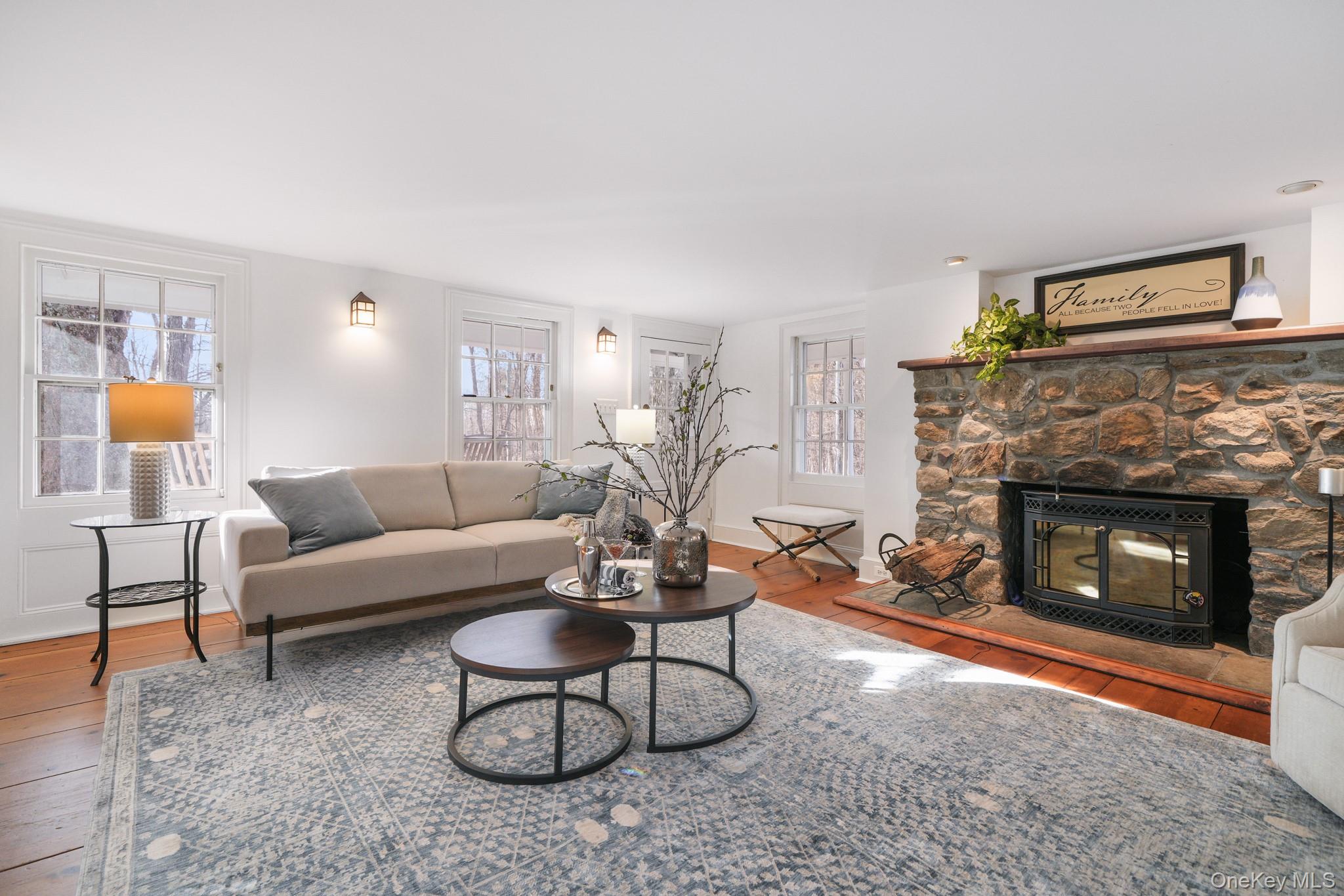 320 Illington Road Ossining, NY 10562 - Photo 9 of 42 a living room with furniture and a fireplace