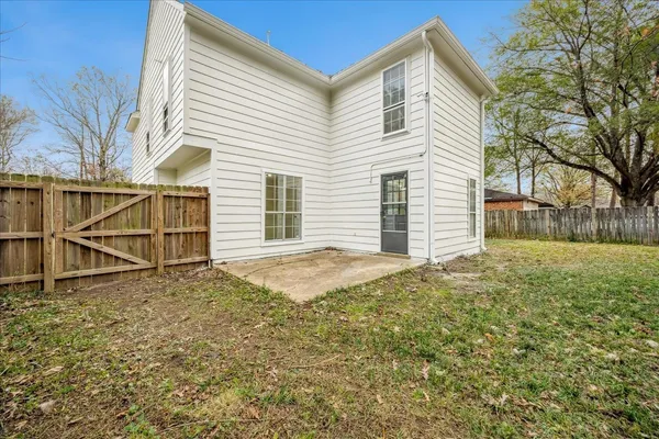 a view of backyard of house
