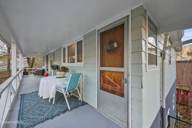 a view of a livingroom with furniture and window