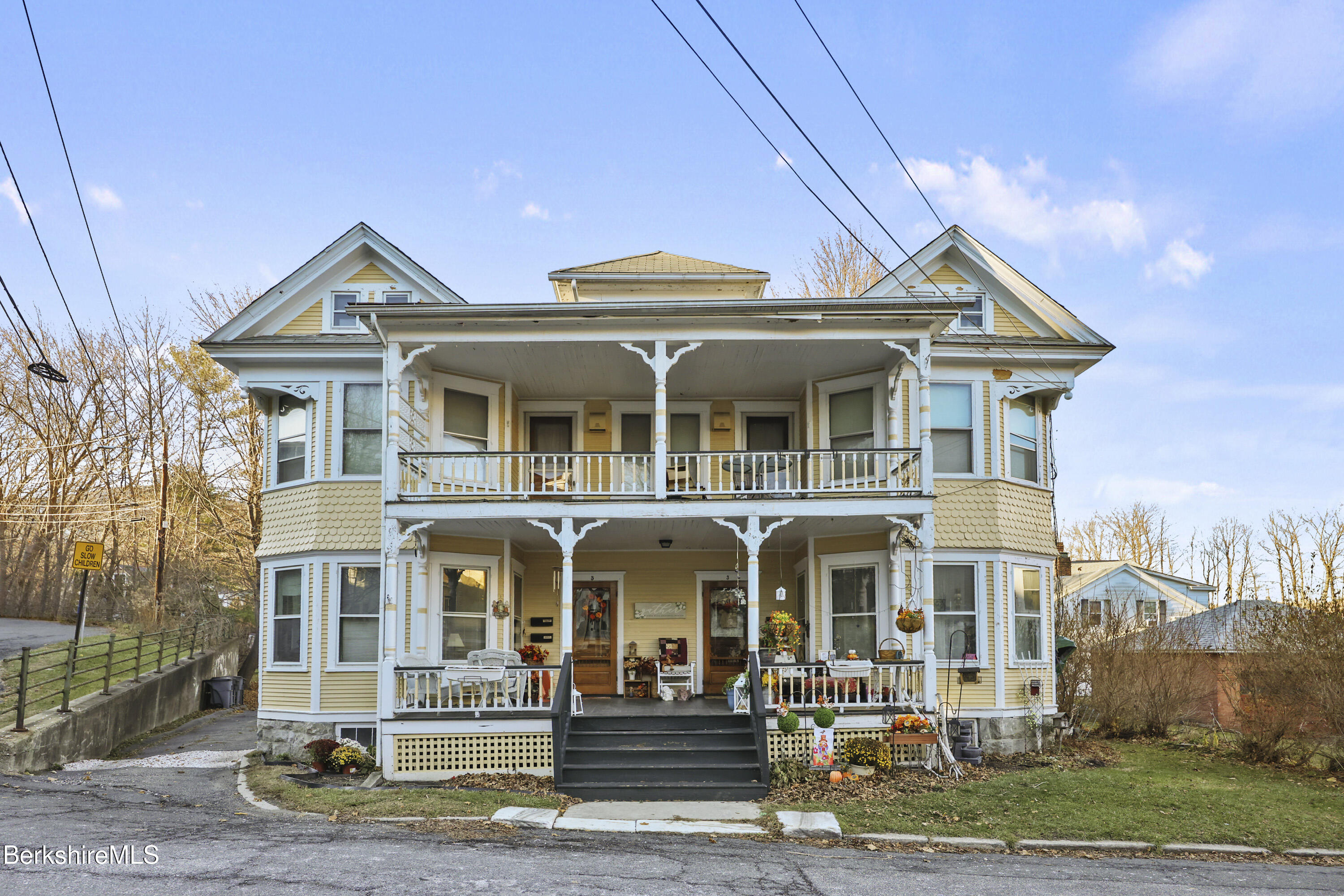 3-5 Melrose Street Adams, MA 01220 - Photo 3 of 37 a front view of a house with a yard