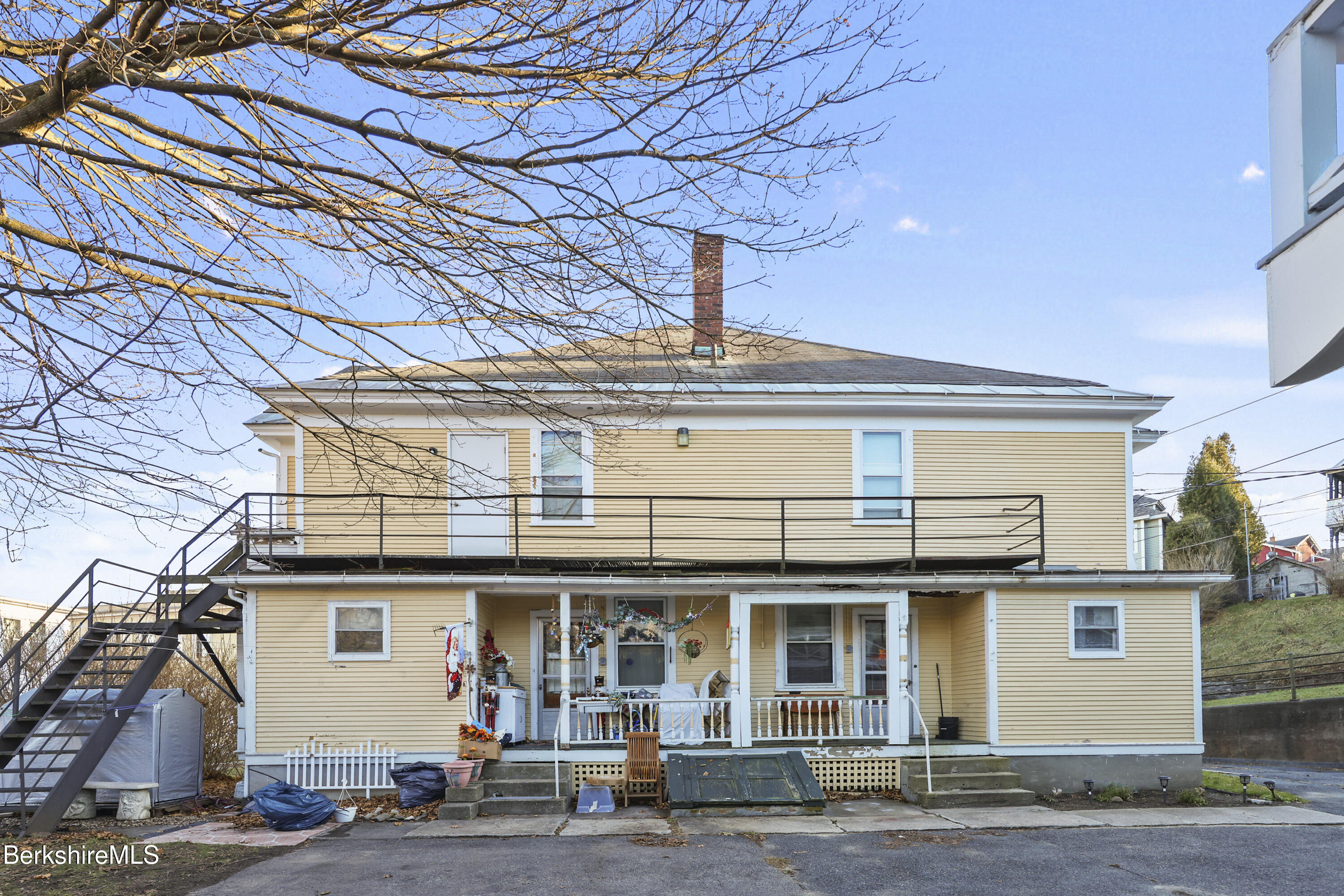 3-5 Melrose Street Adams, MA 01220 - Photo 5 of 37 a view of a building with a street