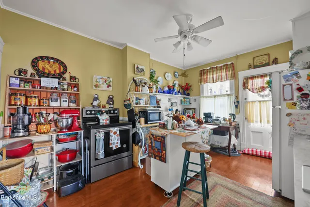 a view of a workspace with furniture and toys