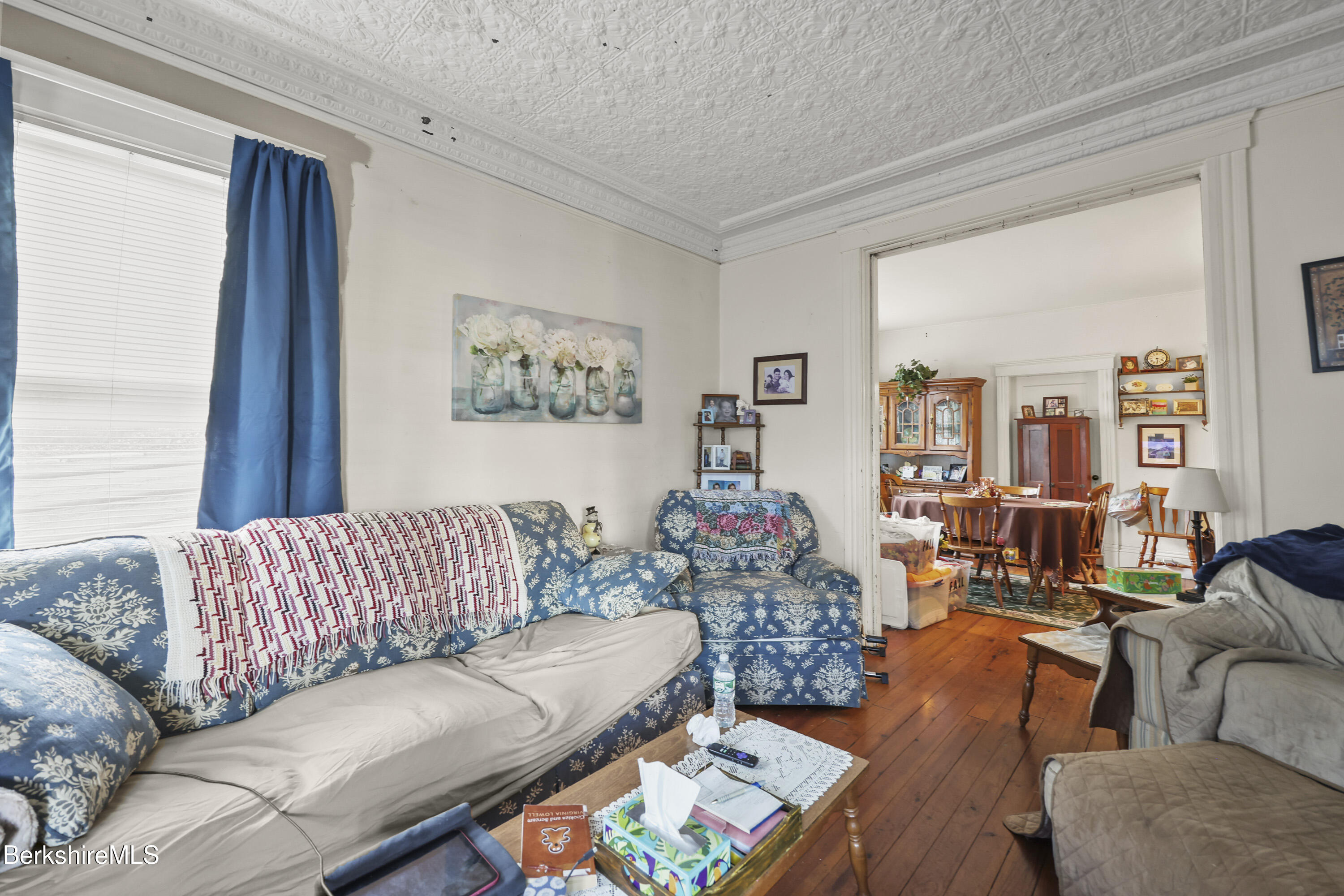 3-5 Melrose Street Adams, MA 01220 - Photo 10 of 37 a living room with furniture and a large window